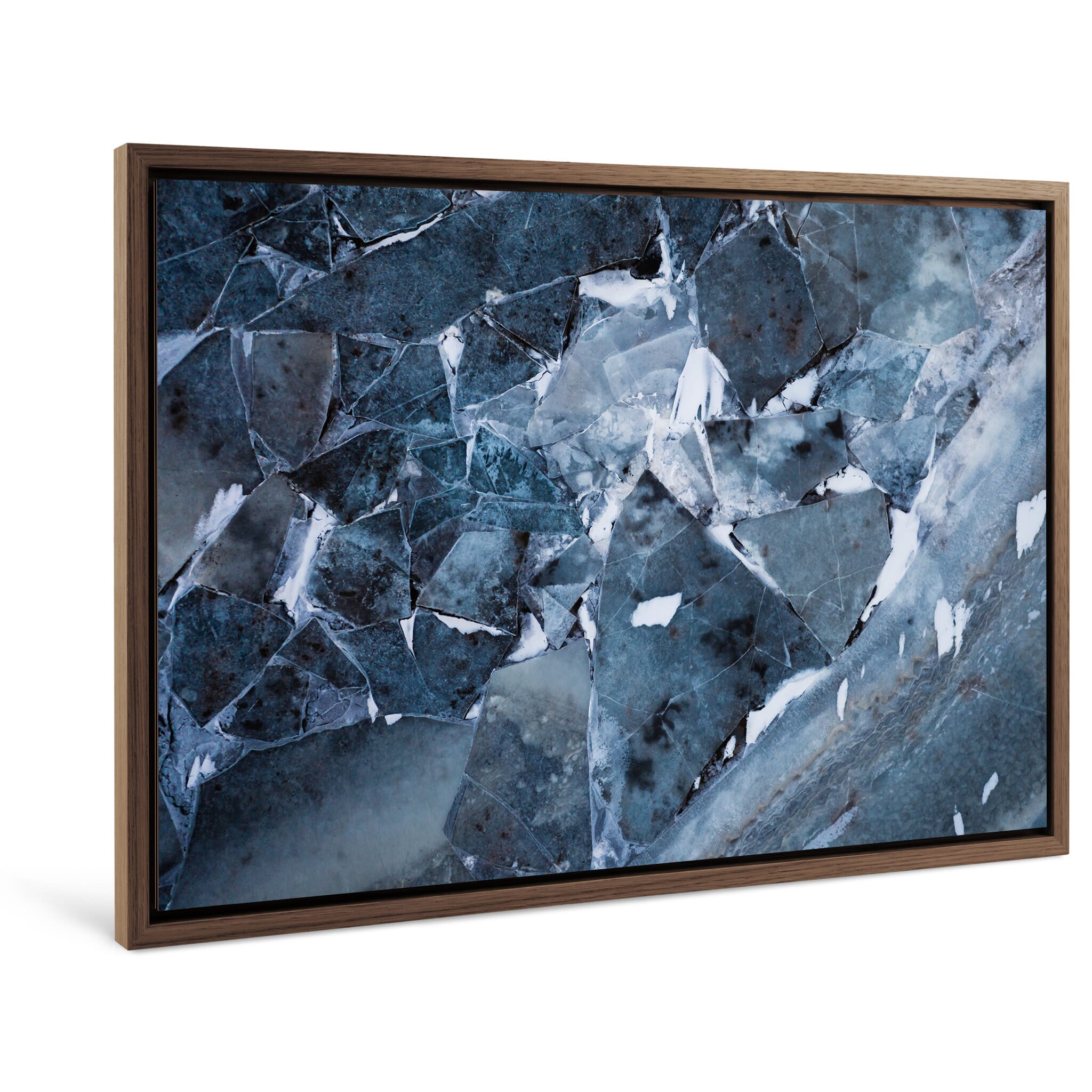 Framed photo print of layered winter ice featuring tones of black, blue, and brown