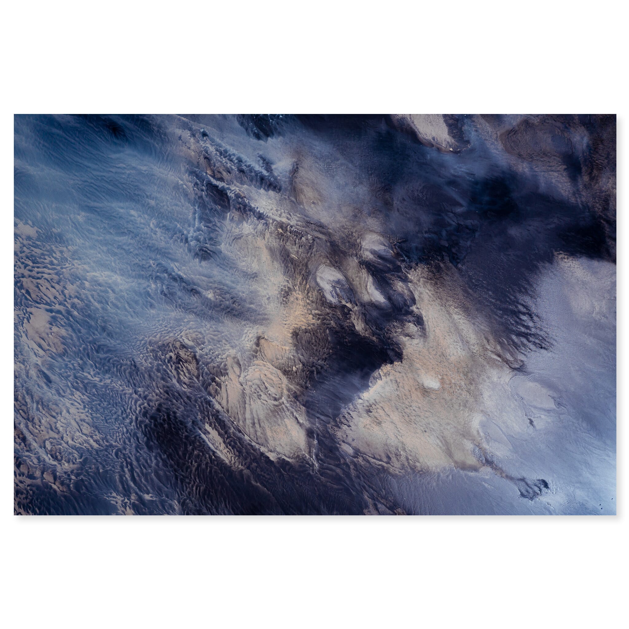 Fine art print of a colorful aerial view of tidal flow across black sand in Iceland