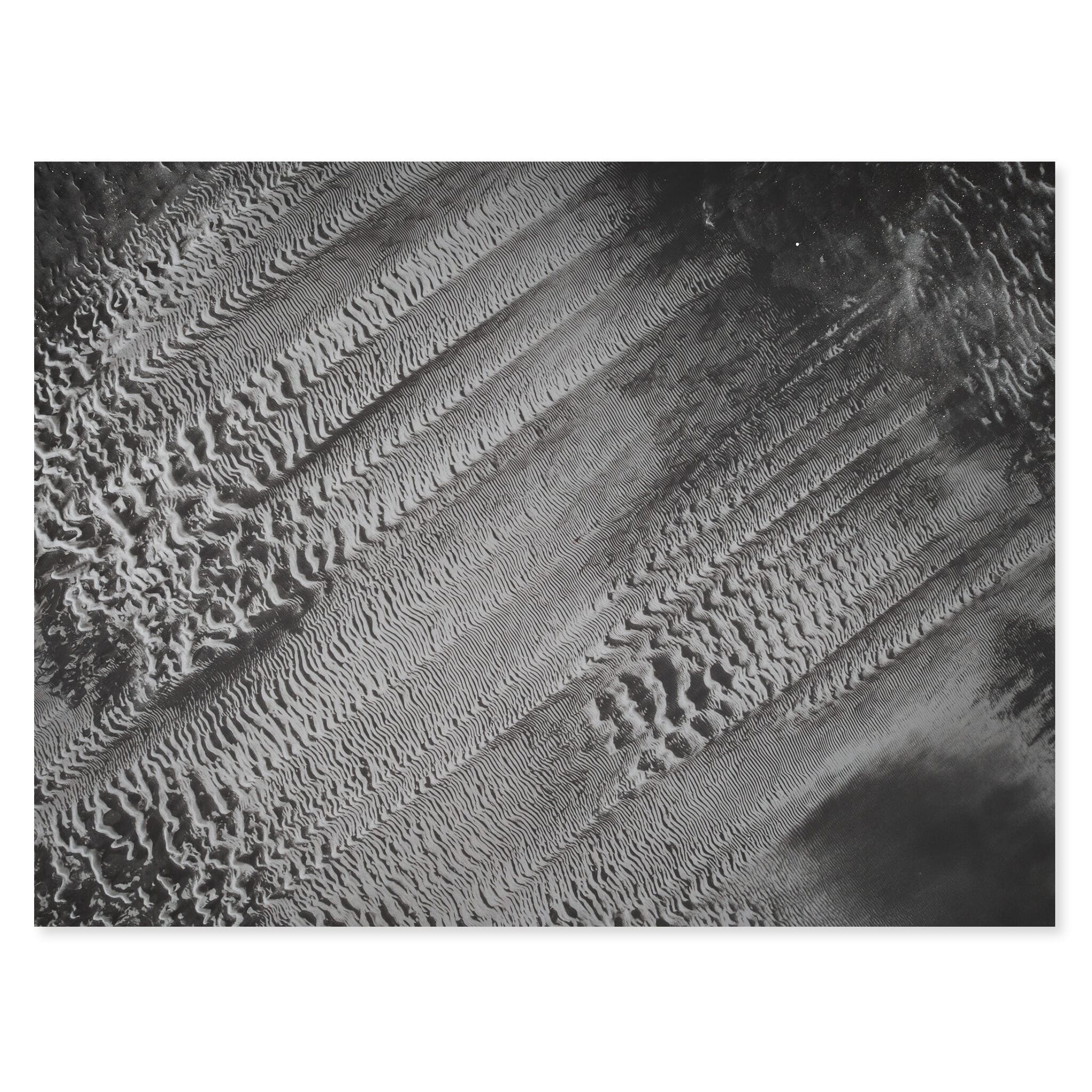 Fine art print of tidal sand patterns in Iceland shaped by receding water