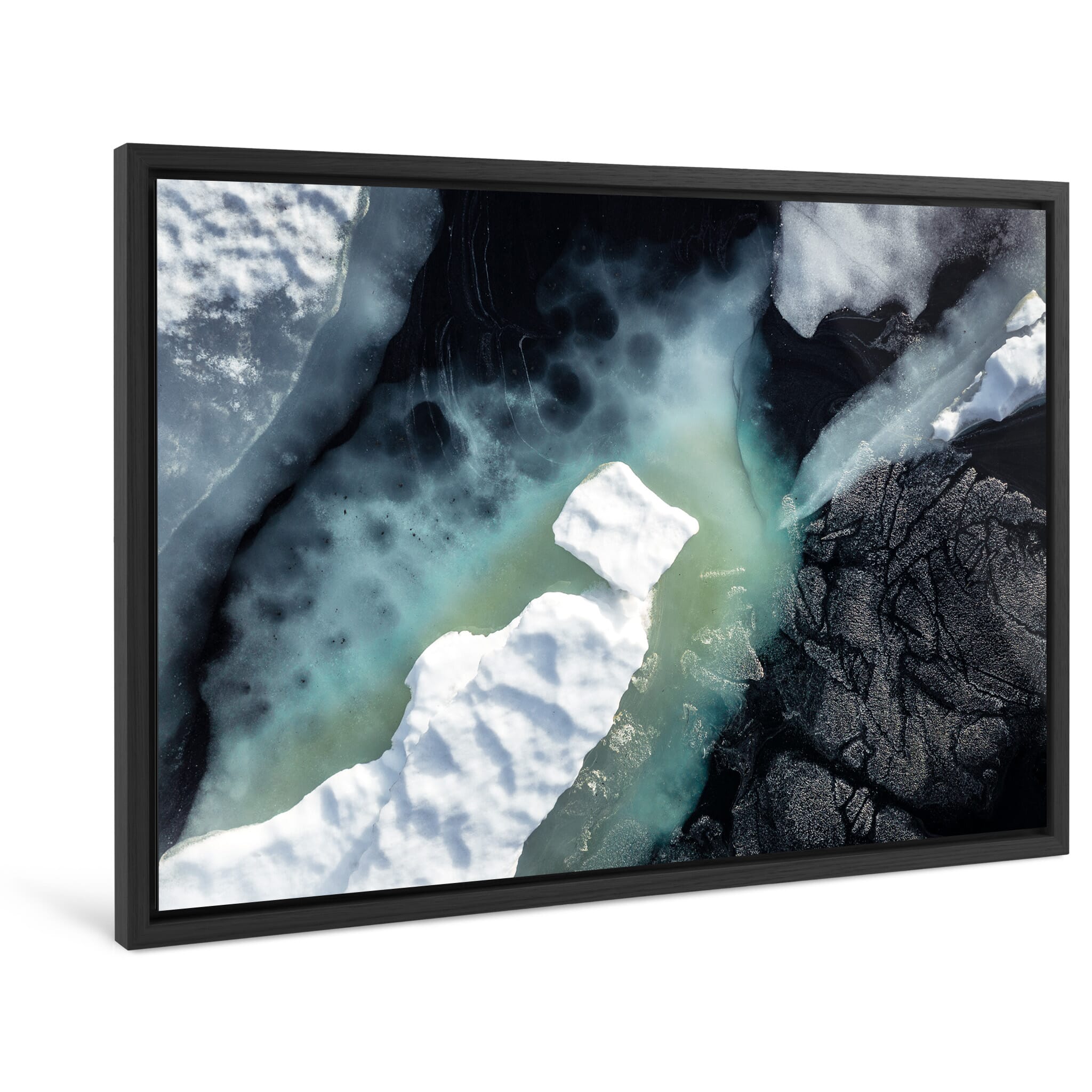 Framed photo print of small icebergs and flower pollen in cold lake water
